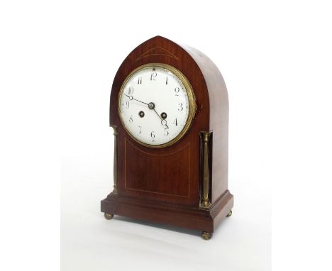 Mahogany two train mantel clock, the Japy Freres movement striking on a gong, the 4.75" circular dial within a lancet brass p