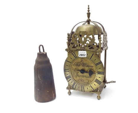Reproduction brass lantern clock, the 6.5" chapter ring enclosing a recessed centre signed Tho. Moore, Ipswich, surmounted by