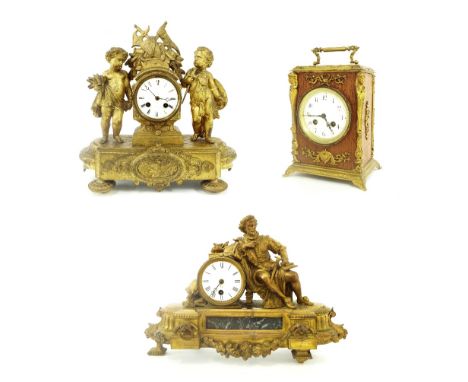 Gilded spelter two train mantel clock, modelled as standing cherubs flanking a pedestal enclosing a 3.25" circular dial upon 