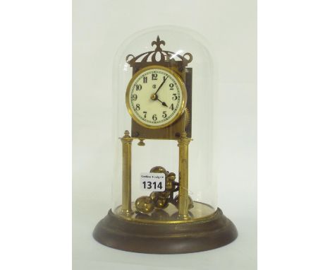 Gustav Becker torsion four hundred day mantel clock, the 2.75" dial within a brass case supported upon two pillars and steppe