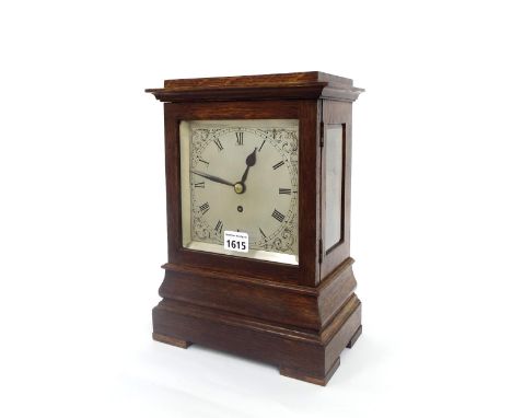 Oak four glass single fusee library mantel clock, the 5.5" engraved square dial within a bevelled glazed stepped bombe case, 
