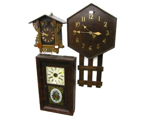 Arts & Crafts oak wall timepiece, the 16.25" dial with Arabic numerals within a hexagonal beaded surround over a fenced drop;
