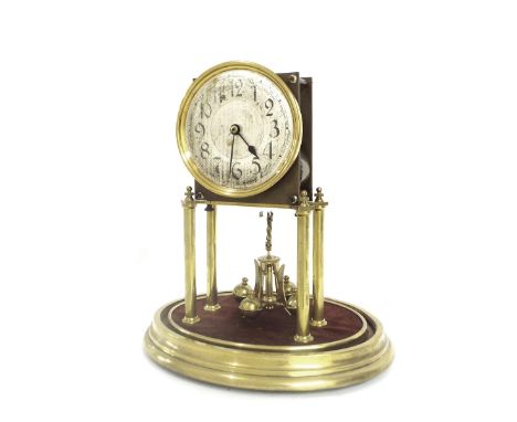 Torsion 400 day two train mantel clock (model 290) striking on a bell, the 4.5" silvered dial within a brass case, upon four 