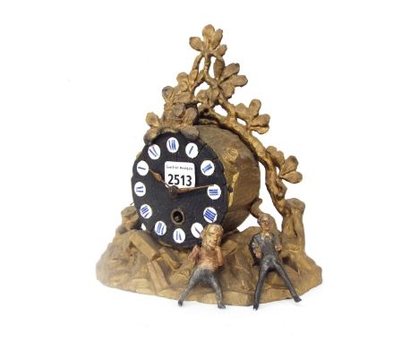 Interesting gilt metal seesaw mantel clock timepiece, the 4" dial with Roman cartouche enamel numerals in the form of a tree 