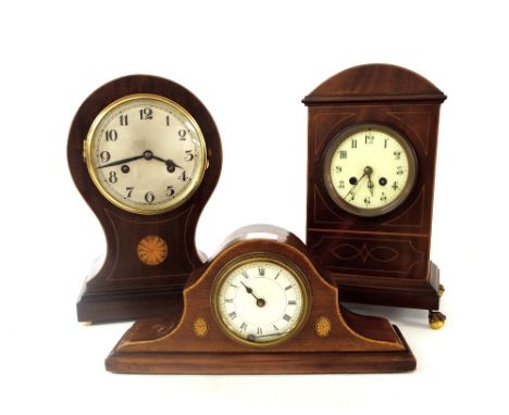 Mahogany balloon shaped inlaid two train mantel clock striking on a gong, 12.5" high; also two other mahogany inlaid mantel c