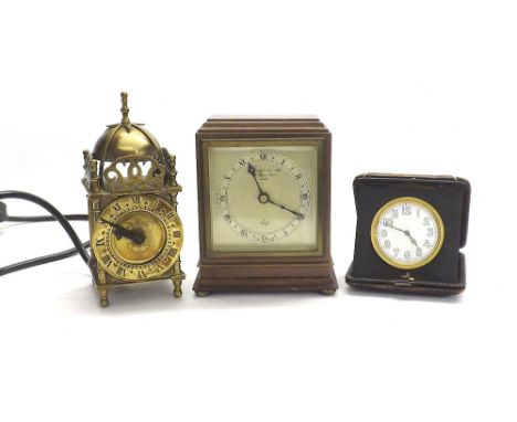 Small electric lantern clock, 7.25" high; also a small Garrard & Co Limited Elliott mantel clock and a Swiss travel timepiece
