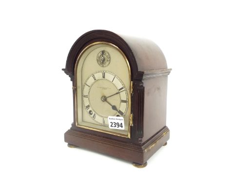 Mahogany two train mantel clock striking on a gong, the 4.5" silvered arched dial signed Sir John Bennett Limited, London, wi