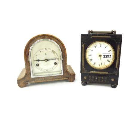 Small oak Napoleon hat two train mantel clock, 7.25" high; together with an ebonised mantel clock timepiece, 9" high (2)