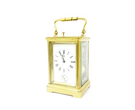 French quarter repeating carriage clock, the movement striking on two gongs, the 2" principal dial above a subsidiary alarm d
