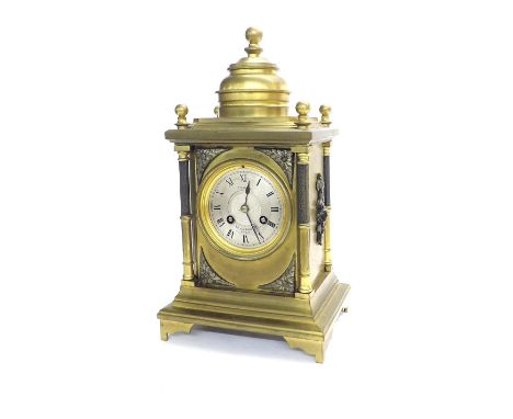 French brass two train mantel clock striking on a bell, the 3" silvered dial signed J.W. Benson, 25 Old Bond St. London, with