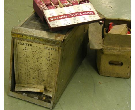 Vintage metal cabinet containing lighter spares including Ronson; together with a box containing various other related spares