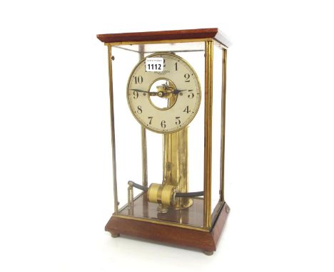 Electric four glass mantel clock, the 5.5" silvered dial with skeletonised centre signed Bulle-Clock, within a brass bound ma