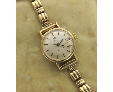 Omega automatic 9ct lady's bracelet watch, circa 1974, silvered dial with baton markers, sweep centre seconds and date apertu