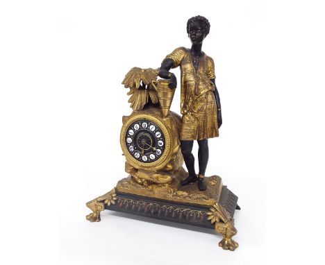 French ormolu and bronze blackamoor figural two train mantel clock, the Japy Freres movement striking on a bell, the 3.25" br