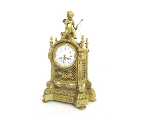 Gilt metal two train mantel clock, the movement with outside countwheel striking on a bell, the 4.25" circular dial signed Le