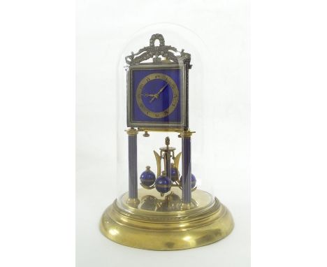 Brass and blue guilloche enamel torsion mantel clock, the 2.75" square dial with silvered chapter ring, supported upon two fr