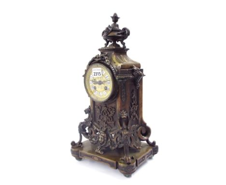 French two train bronze mantel clock, the movement with outside countwheel striking on  a bell, the 3.5" gilt metal dial with