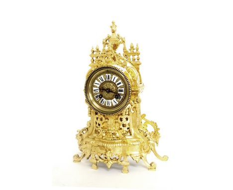 French gilt metal two train mantel clock, the movement with outside countwheel striking on a bell, the 3" dial with raised Ro