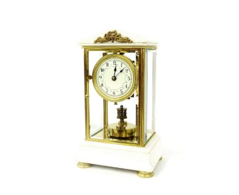 Good white marble and brass bound four glass torsion mantel clock (model 238), the 3.5" cream dial over a disc pendulum and w