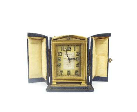 Zenith eight day alarm clock, the rectangular dial signed Camerer Cuss & Co., London W.C.1, Zenith, eight days to the centre,