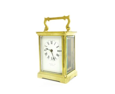 French carriage clock timepiece, the dial signed Finnigans Limited, Manchester, within a corniche brass case, 5.5" high