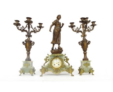 French green onyx and spelter figural two train mantel clock garniture, the movement with outside countwheel striking on a be