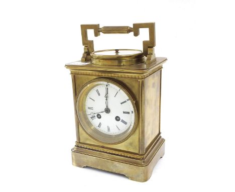 French brass two train mantel clock, the movement with outside countwheel striking on a bell, the 3.5" white dial within a ca