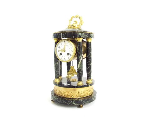 Green marble portico type two train mantel clock, the movement with outside countwheel striking on a bell, the 3.5" circular 