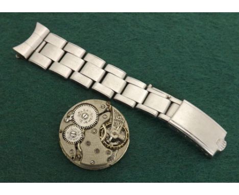 Rolex vintage wristwatch movement, 15 jewels, black dial, 28mm diameter; also a part Rolex Oyster bracelet (2)