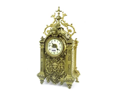 Ornate cast brass two train mantel clock, the S. Marti movement striking on a bell, the 3.5" circular dial within an ornate c
