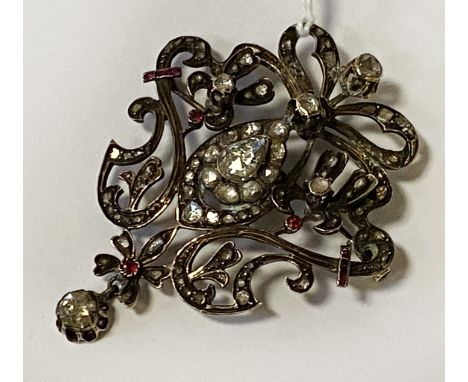 9CT GOLD OUT CUT DIAMOND &amp; RUBY BROOCH 15.9 GRAMS APPROX