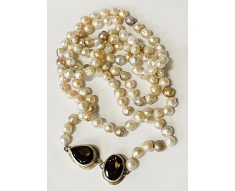 OPERA LENGTH PEARL NECKLACE MARKED 925 SIGNED BY VERD LAOR WITH TWO LARGE SMOKEY QUARTZ STONES