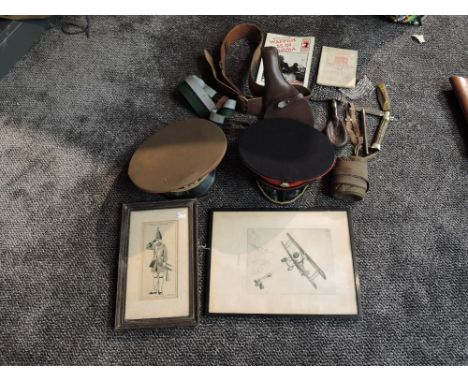 A collection of Militaria including Puttees, Leather Belt &amp; Holster, Folding Dark Glasses, Cloth Belt, Powder Flask, Two 