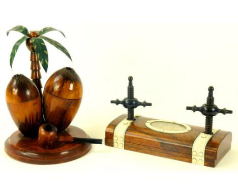 A VICTORIAN IVORY MOUNTED ROSEWOOD AND EBONY TIE PRESS AND AN OLIVE WOOD TOBACCO JAR AND PIPE STAND IN THE FORM OF A PINE TRE