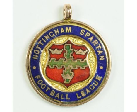 SOCCER.  A 9CT GOLD AND ENAMEL MEDAL OF NOTTINGHAM SPARTAN FOOTBALL LEAGUE, REVERSE ENGRAVED CHAMPIONS 1924, BIRMINGHAM 1923,