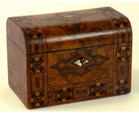 A VICTORIAN WALNUT TEA CADDY DECORATED WITH COLOURED STRAW WORK BANDING, THE DIVIDED INTERIOR RETAINING THE PAIR OF ORIGINAL 