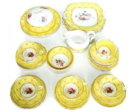 A STAFFORDSHIRE BONE CHINA YELLOW GROUND FLORAL TEA SERVICE, PRINTED MARK OF THE RETAILER THOMAS GOODE AND CO