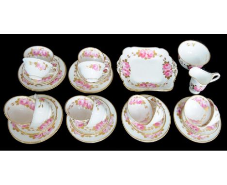 A GEORGE JONES CRESCENT CHINA TEA SERVICE PAINTED WITH ROSES AND GILT, CIRCA 1930