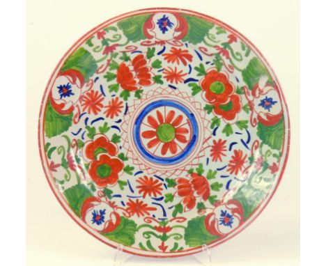 A DUTCH DELFTWARE RED, BLUE AND GREEN PAINTED DISH