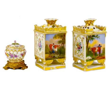 A PAIR OF PARIS PORCELAIN SQUARE POTPOURRI VASES AND COVERS, THE SIDES PAINTED WITH RUSTIC LOVERS OR FLOWERS ON FOUR WINGED G