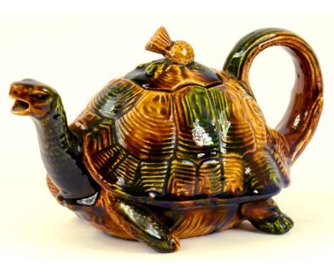 A SCOTTISH MAJOLICA TORTOISE NOVELTY TEAPOT AND COVER, WITH THISTLE KNOP, LATE 19TH CENTURY