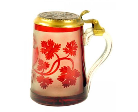 A 19TH CENTURY COPPER GILT MOUNTED BOHEMIAN, RUBY FLASHED AND ETCHED GLASS TANKARD, WITH STAR CUT BASE