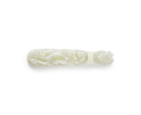 BOUCLE DE CEINTURE EN JADE BLANCXVIIIe/XIXe siècleA WHITE JADE BELTHOOK18th/19th centuryFinely carved with a striding dragon 