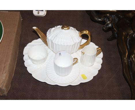A Copeland Spode "Tea For One" set with fluted and gilded decoration
