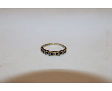 A 9ct gold sapphire and chip diamond set half eternity ring AF, ring size N/O, approx. total weight 1.5gms 