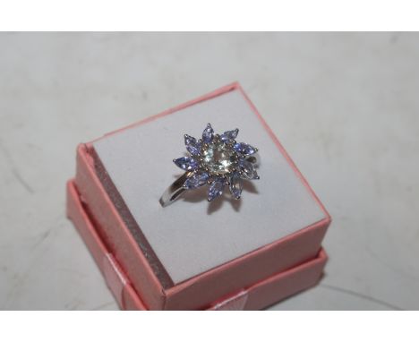 A Sterling silver, tanzanite and citrine flower head ring, ring size R/S