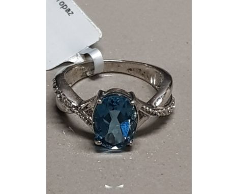 SILVER AND BLUE TOPAZ RING SIZE K 2.8G