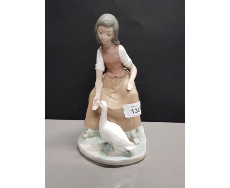 NAO FIGURINE OF A LADY FEEDING A GOOSE