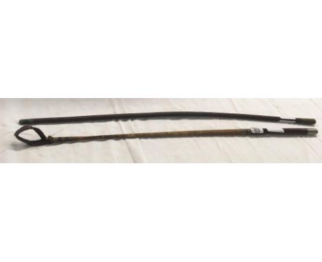 A SWAGGER STICK &amp; A HORSE WHIP