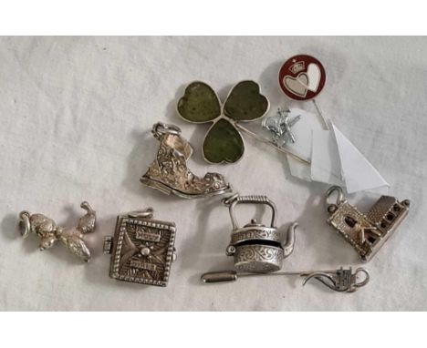 BAG OF SILVER COLOURED CHARMS INCL; THREE LEAF CLOVER HAT PIN &amp; A BLOOD DONATION PIN BADGE